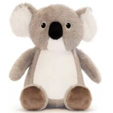 Oswald has a grey and white body, snuggly fur, large ears, brown feet, big black eyes and a large black nose.